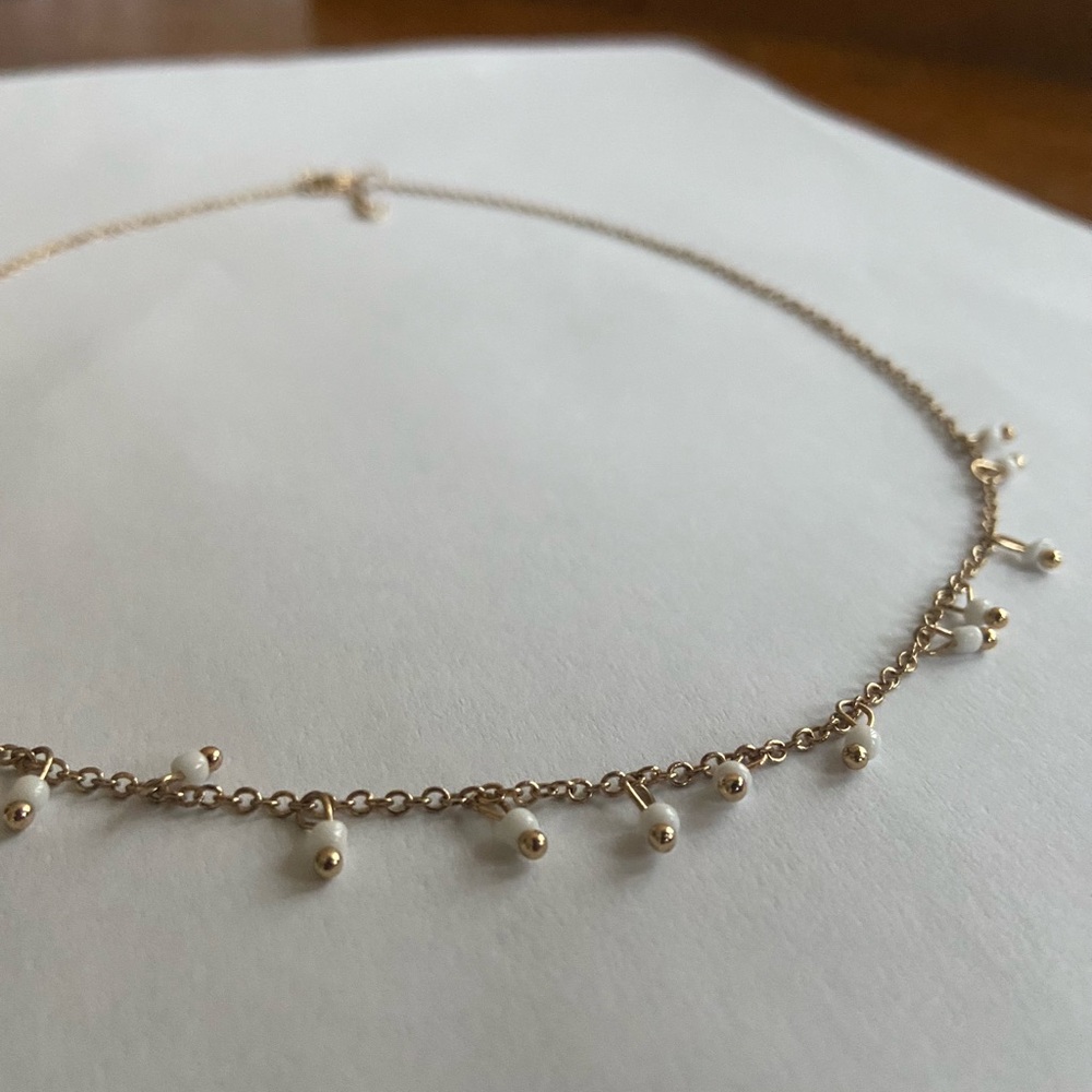 White bead necklace